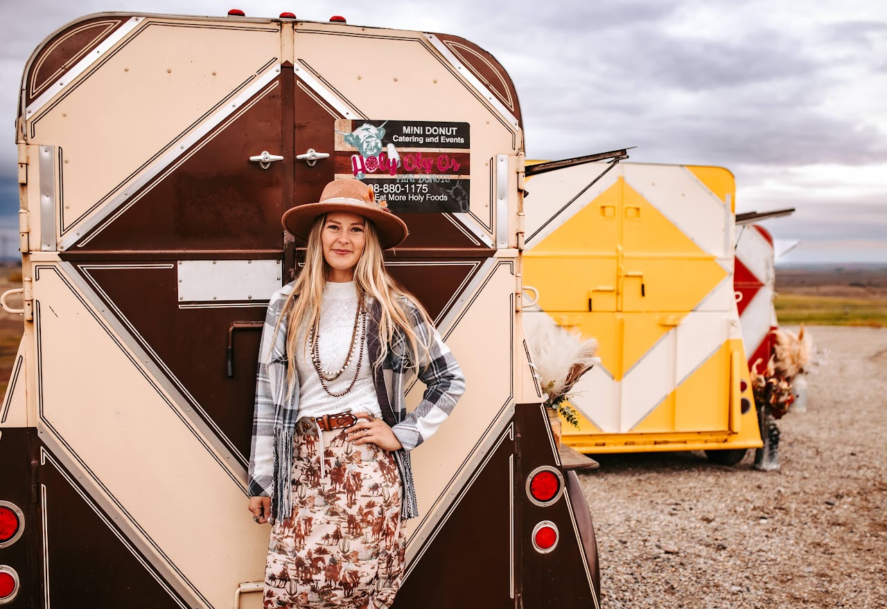 red and yellow trailers with girl in front of yellow